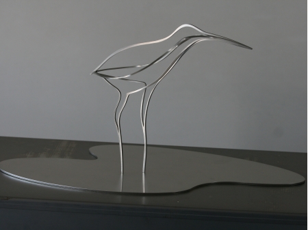 A stainless steel thread figure of a snipe bird.
Standing in a pool of water.

Measurements figure size M: 50 x 24 x 25 cm
Measurements figure size L: 60 x 33 x 25 cm

Size M Series of 8, of which 3 sold.
Size L Series of 8, of which 1 sold.


