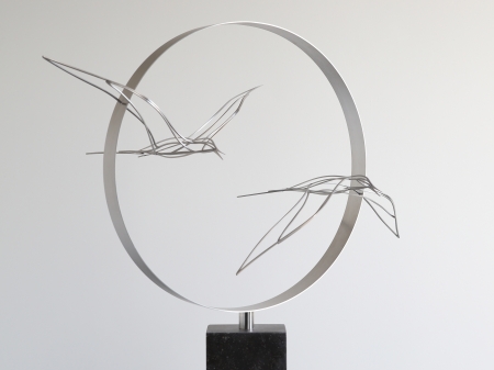 Stainless steel ring with two tern birds flying through. Placed on bluestone pedestal.              
Measurements ring: Ø 48 cm.
Measurements complete art piece: 72 x 32 x 78 cm.

Series of 8, of which 3 sold.
